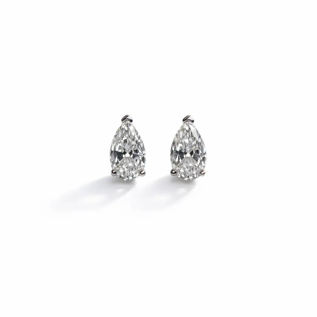 Pear shaped Moissanite Studs On solid 10k Gold post
